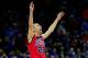 KANSAS CITY, MO - MARCH 22: Marshall Henderson #22 of the Ole Miss Rebels celebrates their 57-46 win over the Wisconsin Badgers during the second round of the 2013 NCAA Men's Basketball Tournament at the Sprint Center on March 22, 2013 in Kansas City, Missouri. (Photo by Jamie Squire/Getty Images)