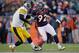 DENVER, CO - JANUARY 08: Ben Roethlisberger #7 of the Pittsburgh Steelers loses the ball against Elvis Dumervil #92 of the Denver Broncos during the AFC Wild Card Playoff game at Sports Authority Field at Mile High on January 8, 2012 in Denver, Colorado. (Photo by Doug Pensinger/Getty Images)