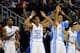 KANSAS CITY, MO - MARCH 22: Leslie McDonald #2, J.P. Tokoto #25, Brice Johnson #11 and Luke Davis #4 of the North Carolina Tar Heels celebrate a 3-point shot from the bench in the second half against the Villanova Wildcats during the second round of the 2013 NCAA Men's Basketball Tournament at the Sprint Center on March 22, 2013 in Kansas City, Missouri. North Carolina won 78-71. (Photo by Jamie Squire/Getty Images)