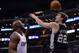 LOS ANGELES, CA - FEBRUARY 21: Tiago Splitter #22 of the San Antonio Spurs shoots over Lamar Odom #7 of the Los Angeles Clippers at Staples Center on February 21, 2013 in Los Angeles, California. NOTE TO USER: User expressly acknowledges and agrees that, by downloading and or using this photograph, User is consenting to the terms and conditions of the Getty Images License Agreement. (Photo by Harry How/Getty Images)