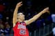 KANSAS CITY, MO - MARCH 22: Marshall Henderson #22 of the Ole Miss Rebels celebrates their 57-46 win over the Wisconsin Badgers during the second round of the 2013 NCAA Men's Basketball Tournament at the Sprint Center on March 22, 2013 in Kansas City, Missouri. (Photo by Jamie Squire/Getty Images)
