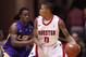 Nov 29, 2011; Houston, TX, USA; Houston Cougars guard Joseph Young (0) posts up LSU Tigers forward Johnny O'Bryant (2) during the second half at Hofheinz Pavillion. LSU won 59-58. Mandatory Credit: Thomas Campbell-US Presswire