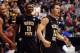 SALT LAKE CITY, UT - MARCH 23: Fred Van Vleet #23 and Cleanthony Early #11 of the Wichita State Shockers celebrate in the second half while taking on the Gonzaga Bulldogs during the third round of the 2013 NCAA Men's Basketball Tournament at EnergySolutions Arena on March 23, 2013 in Salt Lake City, Utah. (Photo by Streeter Lecka/Getty Images)