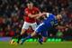 MANCHESTER, ENGLAND - FEBRUARY 10: Tom Cleverley of Manchester United tangles with Leon Osman of Everton during the Barclays Premier League match between Manchester United and Everton at Old Trafford on February 10, 2013 in Manchester, England. (Photo by Shaun Botterill/Getty Images)