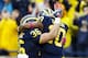 October 13, 2012; Ann Arbor, MI, USA; Michigan wide receiver Jeremy Gallon (10) celebrates his touchdown with fullback Joe Kerridge (36) in the first quarter against the Illinois Fighting Illini at Michigan Stadium. Mandatory Credit: Rick Osentoski-USA TODAY Sports