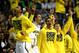 AUBURN HILLS, MI - MARCH 23: Players for the Michigan Wolverines react on the bench in the second half against the Virginia Commonwealth Rams during the third round of the 2013 NCAA Men's Basketball Tournament at The Palace of Auburn Hills on March 23, 2013 in Auburn Hills, Michigan. (Photo by Jonathan Daniel/Getty Images)