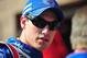 March 23, 2013; Fontana, CA, USA; NASCAR Sprint Cup Series driver Joey Logano (22) speaks with a crew member during practice for the Auto Club 400 at Auto Club Speedway. Mandatory Credit: Gary A. Vasquez-USA TODAY Sports
