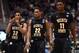 SALT LAKE CITY, UT - MARCH 23: Fred Van Vleet #23, Carl Hall #22 and Cleanthony Early #11 of the Wichita State Shockers look on in the second half while taking on the Gonzaga Bulldogs during the third round of the 2013 NCAA Men's Basketball Tournament at EnergySolutions Arena on March 23, 2013 in Salt Lake City, Utah. (Photo by Harry How/Getty Images)