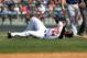 March 25, 2013; Sarasota, FL, USA; Baltimore Orioles third baseman Wilson Betemit (24) reacts as he falls to the ground after suffering an injury during the fifth inning against the Boston Red Sox at Ed Smith Stadium. Mandatory Credit: Kim Klement-USA TODAY Sports