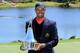 ORLANDO, FL - MARCH 25: Tiger Woods of the United States proudly holds the trophy the win meant he re-gained the World's number one position after the final round of the 2013 Arnold Palmer Invitational Presented by Mastercard at Bay Hill Golf and Country Club on March 25, 2013 in Orlando, Florida. (Photo by David Cannon/Getty Images)
