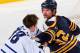 BUFFALO, NY - MARCH 21: John Scott #32 of the Buffalo Sabres fights with Frazer McLaren #38 of the Toronto Maple Leafs in the first period at First Niagara Center on March 21, 2013 in Buffalo, United States. (Photo by Rick Stewart/Getty Images)