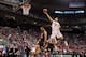 SALT LAKE CITY, UT - MARCH 23: Nick Johnson #13 of the Arizona Wildcats goes up for a shot over Christian Webster #15 of the Harvard Crimson in the first half during the third round of the 2013 NCAA Men's Basketball Tournament at EnergySolutions Arena on March 23, 2013 in Salt Lake City, Utah. (Photo by Streeter Lecka/Getty Images)