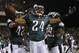 PHILADELPHIA, PA - OCTOBER 30: Nnamdi Asomugha #24 of the Philadelphia Eagles celebrates his interception with teammates Kurt Coleman #42 and Brian Rolle #59 during a game against the Dallas Cowboys at Lincoln Financial Field on October 30, 2011 in Philadelphia, Pennsylvania. (Photo by Rich Schultz /Getty Images)