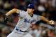 WASHINGTON, DC - SEPTEMBER 20: Starting pitcher Chris Capuano #35 of the Los Angeles Dodgers delivers to a Washington Nationals batter during the third inning at Nationals Park on September 20, 2012 in Washington, DC. (Photo by Rob Carr/Getty Images)