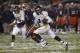 NEW YORK, NY - DECEMBER 29: Stedman Bailey #3 of the West Virginia Mountaineers runs the ball for a touchdown against the Syracuse Orange during the New Era Pinstripe Bowl at Yankee Stadium on December 29, 2012 in the Bronx borough of New York City. (Photo by Jeff Zelevansky/Getty Images)