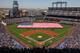 DENVER, CO - APRIL 09: The American Flag is displayed on the field as the national anthem is observed prior to the game between the San Francisco Giants and the Colorado Rockies on Opening Day at Coors Field on April 9, 2012 in Denver, Colorado. The Giants defeated the Rockies 7-0. (Photo by Doug Pensinger/Getty Images)