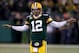 GREEN BAY, WI - JANUARY 05: Quarterback Aaron Rodgers #12 of the Green Bay Packers reacts on the field during pregame warm ups before taking on the Minnesota Vikings in the NFC Wild Card Playoff game at Lambeau Field on January 5, 2013 in Green Bay, Wisconsin. (Photo by Jonathan Daniel/Getty Images)