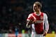AMSTERDAM, NETHERLANDS - DECEMBER 01: Christian Eriksen of Ajax gets ready to give a ball to the fans after victory in the Eredivisie match between Ajax Amsterdam and PSV Eindhoven at Amsterdam Arena on December 1, 2012 in Amsterdam, Netherlands. (Photo by Dean Mouhtaropoulos/Getty Images)
