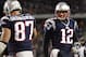 Dec 30, 2012; Foxborough, MA, USA; New England Patriots quarterback Tom Brady (12) and tight end Rob Gronkowski (87) celebrate a touchdown against the Miami Dolphins during the second half at Gillette Stadium. Mandatory Credit: Mark L. Baer-USA TODAY Sports