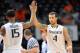 Feb 5, 2013; Coral Gables, FL, USA; Miami Hurricanes guard Trey McKinney Jones (right) greets teammate Rion Brown (left) after Rion made a three point basket against Boston College Eagles during the first half at the BankUnited Center. Mandatory Credit: Steve Mitchell-USA TODAY Sports