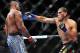 Feb 2, 2013; Las Vegas, NV, USA; Antonio Silva (right) throws a straight right at Allistar Overeem (left) during UFC 156 at the Mandalay Bay Events Center. Mandatory Credit: Gary A. Vasquez-USA TODAY Sports