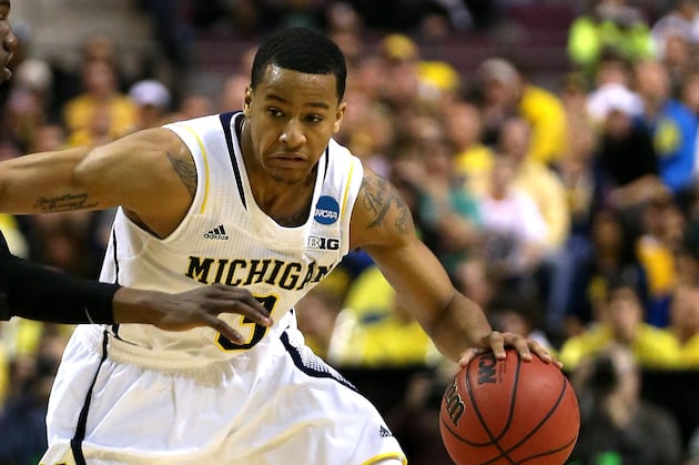 Kansas Aims to Keep Michigan Guards on Edge
