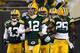GREEN BAY, WI - JANUARY 05: Quarterback Aaron Rodgers #12 of the Green Bay Packers leads the Packers onto the field during pregame warm ups before taking on the Minnesota Vikings in the NFC Wild Card Playoff game at Lambeau Field on January 5, 2013 in Green Bay, Wisconsin. (Photo by Jonathan Daniel/Getty Images)