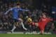 LONDON, ENGLAND - JANUARY 16: Oscar of Chelsea goes for the ball with Steven Davis of Southampton during the Barclays Premier League match between Chelsea and Southampton at Stamford Bridge on January 16, 2013 in London, England. (Photo by Christopher Lee/Getty Images)