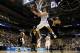 AUBURN HILLS, MI - MARCH 23: Mitch McGary #4 of the Michigan Wolverines drives for a shot attmpt against David Hinton #34 of the Virginia Commonwealth Rams during the third round of the 2013 NCAA Men's Basketball Tournament at The Palace of Auburn Hills on March 23, 2013 in Auburn Hills, Michigan. (Photo by Gregory Shamus/Getty Images)