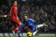 LONDON, ENGLAND - JANUARY 16: Juan Mata of Chelsea is fouled by Maya Yoshida of Southampton during the Barclays Premier League match between Chelsea and Southampton at Stamford Bridge on January 16, 2013 in London, England. (Photo by Christopher Lee/Getty Images)