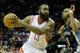 HOUSTON, TX - DECEMBER 22: James Harden #13 of the Houston Rockets drives against Mike Conley #11 of the Memphis Grizzlies at the Toyota Center on December 22, 2012 in Houston, Texas. NOTE TO USER: User expressly acknowledges and agrees that, by downloading and or using this photograph, User is consenting to the terms and conditions of the Getty Images License Agreement. (Photo by Scott Halleran/Getty Images)