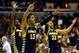 WASHINGTON, DC - MARCH 28: Vander Blue #13 of the Marquette Golden Eagles celebrates with his team after defeating the Miami (Fl) Hurricanes during the East Regional Round of the 2013 NCAA Men's Basketball Tournament at Verizon Center on March 28, 2013 in Washington, DC. (Photo by Win McNamee/Getty Images)