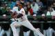 March 27, 2013; Sarasota, FL, USA; Baltimore Orioles second baseman Brian Roberts (1) attempted to bunt in the first inning against the New York Yankees at Ed Smith Stadium. Mandatory Credit: Kim Klement-USA TODAY Sports
