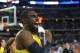 Mar 29, 2013; Arlington, TX, USA; Michigan Wolverines guard Tim Hardaway Jr. (10) celebrates after defeating the Kansas Jayhawks 87-75 in overtime in the semifinals of the South regional of the 2013 NCAA Tournament at Cowboys Stadium. Mandatory Credit: Matthew Emmons-USA TODAY Sports