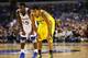 ARLINGTON, TX - MARCH 29: Trey Burke #3 of the Michigan Wolverines and Elijah Johnson #15 of the Kansas Jayhawks look on during overtime during the South Regional Semifinal round of the 2013 NCAA Men's Basketball Tournament at Dallas Cowboys Stadium on March 29, 2013 in Arlington, Texas. (Photo by Ronald Martinez/Getty Images)