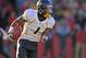 Nov 23, 2012; Ames, Iowa, USA; West Virginia Mountaineers running back Tavon Austin (1) rushes down field against the Iowa State Cyclones during the first half at Jack Trice Stadium. Mandatory Credit: Peter G. Aiken-USA TODAY Sports