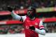 LONDON, ENGLAND - MARCH 30: Gervinho of Arsenal celebrates as he scores their first goal during the Barclays Premier League match between Arsenal and Reading at Emirates Stadium on March 30, 2013 in London, England. (Photo by Jamie McDonald/Getty Images)