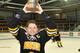 Caitlin Cahow proudly hoisting the Clarkson Cup (Image obtained from CWHL facebook page; https://www.facebook.com/#!/photo.php?fbid=10151495104278251&set=pb.369861893250.-2207520000.1364699508&type=3&theater)
