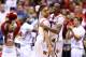 INDIANAPOLIS, IN - MARCH 29: (L-R) Russ Smith #2 and Kevin Ware #5 of the Louisville Cardinals celebrate after they won 77-69 against the Oregon Ducks during the Midwest Region Semifinal round of the 2013 NCAA Men's Basketball Tournament at Lucas Oil Stadium on March 29, 2013 in Indianapolis, Indiana. (Photo by Andy Lyons/Getty Images)