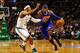 BOSTON, MA - JANUARY 24: Carmelo Anthony #7 of the New York Knicks drives to the basket in front of Paul Pierce #34 of the Boston Celtics during the game on January 24, 2013 at TD Garden in Boston, Massachusetts. NOTE TO USER: User expressly acknowledges and agrees that, by downloading and or using this photograph, User is consenting to the terms and conditions of the Getty Images License Agreement. (Photo by Jared Wickerham/Getty Images)