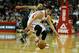 HOUSTON, TX - MARCH 24: Jeremy Lin #7 of the Houston Rockets reaches for the ball in front of Tony Parker #9 of the San Antonio Spurs at Toyota Center on March 24, 2013 in Houston, Texas. NOTE TO USER: User expressly acknowledges and agrees that, by downloading and or using this photograph, User is consenting to the terms and conditions of the Getty Images License Agreement. (Photo by Scott Halleran/Getty Images)