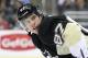 March 28, 2013; Pittsburgh, PA, USA; Pittsburgh Penguins center Sidney Crosby (87) glances over his shoulder at the face-off circle against the Winnipeg Jets during the second period at the CONSOL Energy Center. Mandatory Credit: Charles LeClaire-USA TODAY Sports