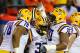 ATLANTA, GA - DECEMBER 31: Jeremy Hill #33 of the LSU Tigers reacts after scoring a touchdown against the Clemson Tigers with Vadal Alexander #78 and La'el Collins #70 during the 2012 Chick-fil-A Bowl at Georgia Dome on December 31, 2012 in Atlanta, Georgia. (Photo by Kevin C. Cox/Getty Images)