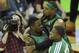 Mar 27, 2013; Cleveland, OH, USA; Boston Celtics power forward Jeff Green (left) is greeted by small forward Paul Pierce (center) and shooting guard Terrence Williams after Green's game-winning basket against the Cleveland Cavaliers at Quicken Loans Arena. Mandatory Credit: David Richard-USA TODAY Sports