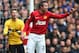 LONDON, ENGLAND - APRIL 01: Robin van Persie of Manchester United gestures to team mates during the FA Cup with Budweiser Sixth Round Replay match between Chelsea and Manchester United at Stamford Bridge on April 1, 2013 in London, England. (Photo by Paul Gilham/Getty Images)