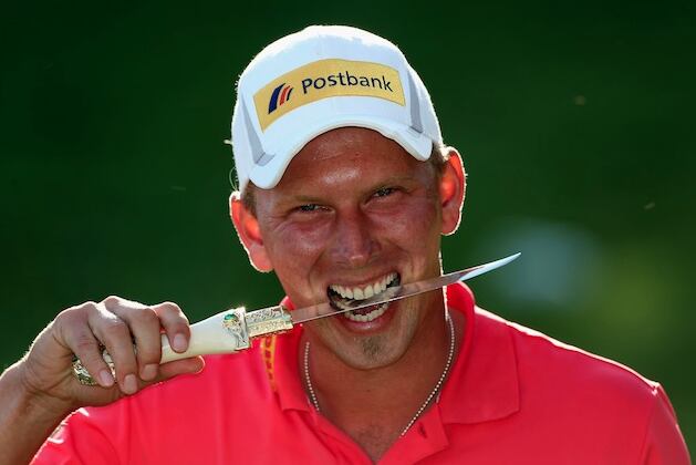 PHOTOS: Marcel Siem Wins on European Tour, Bites Dagger