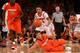 NEW YORK, NY - MARCH 16: Michael Carter-Williams #1 of the Syracuse Orange dives for a looseball against Peyton Siva #3 and Luke Hancock (R) #11 of the Louisville Cardinals during the final of the Big East Men's Basketball Tournament at Madison Square Garden on March 16, 2013 in New York City. (Photo by Elsa/Getty Images)