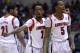 Mar 29, 2013; Indianapolis, IN, USA; Louisville Cardinals players Russ Smith (2) and Kevin Ware (5) react in the first half during the semifinals of the Midwest regional of the 2013 NCAA tournament against the Oregon Ducks at Lucas Oil Stadium. Mandatory Credit: Jamie Rhodes-USA TODAY Sports