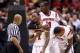 INDIANAPOLIS, IN - MARCH 31: (L-R) Russ Smith #2, Gorgui Dieng #10 and Chane Behanan #21 of the Louisville Cardinals react after Kevin Ware #5 suffered a compound fracture to his leg in the first half against the Duke Blue Devils during the Midwest Regional Final round of the 2013 NCAA Men's Basketball Tournament at Lucas Oil Stadium on March 31, 2013 in Indianapolis, Indiana. (Photo by Andy Lyons/Getty Images)