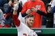 WASHINGTON, DC - APRIL 01: Bryce Harper #34 of the Washington Nationals waves to the crowd after hitting a solo home run against the Miami Marlins during the fourth inning of their opening day game at Nationals Park on April 1, 2013 in Washington, DC. (Photo by Rob Carr/Getty Images)